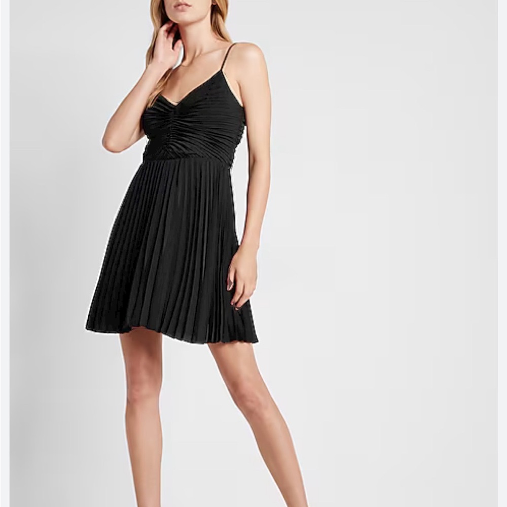 NWT cute and flowy little black dress.  Womens XS